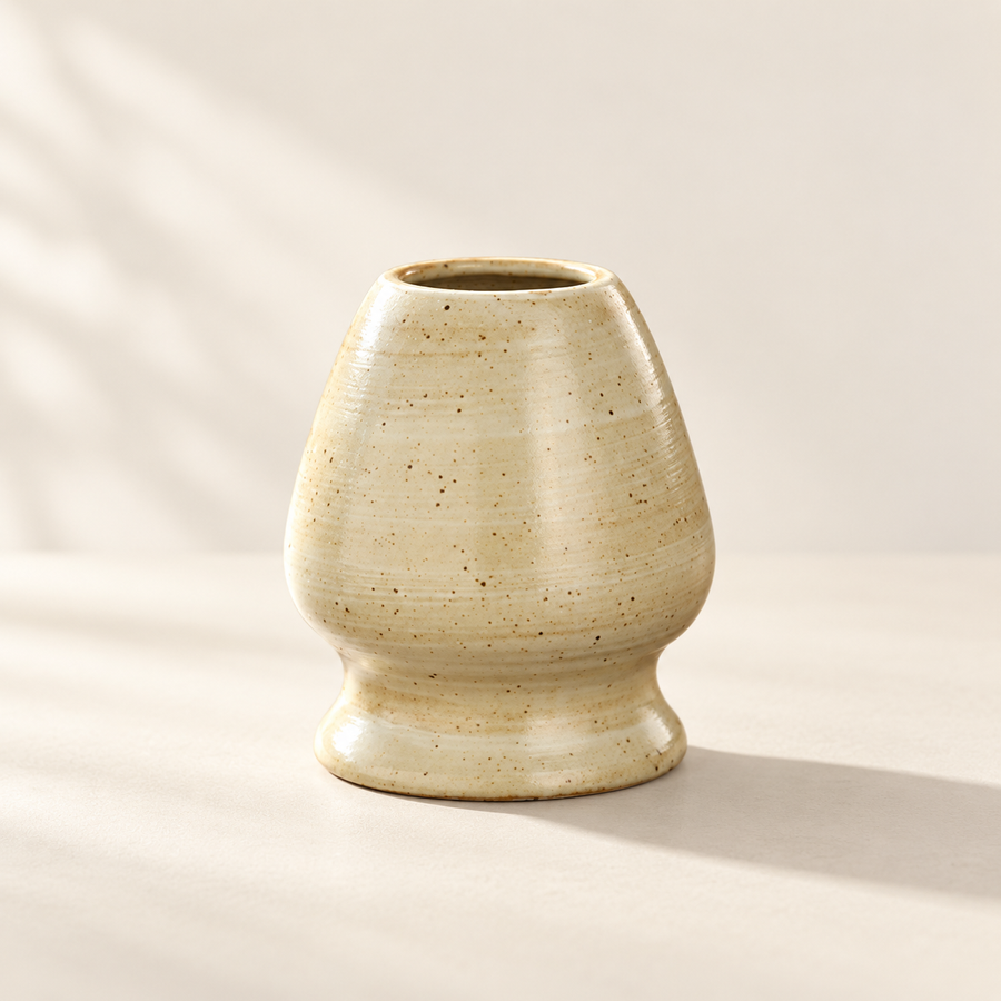 Ceramic matcha whisk holder in the cream studio
