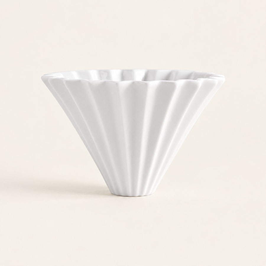 Ceramic pour-over coffee dripper in the cream studio