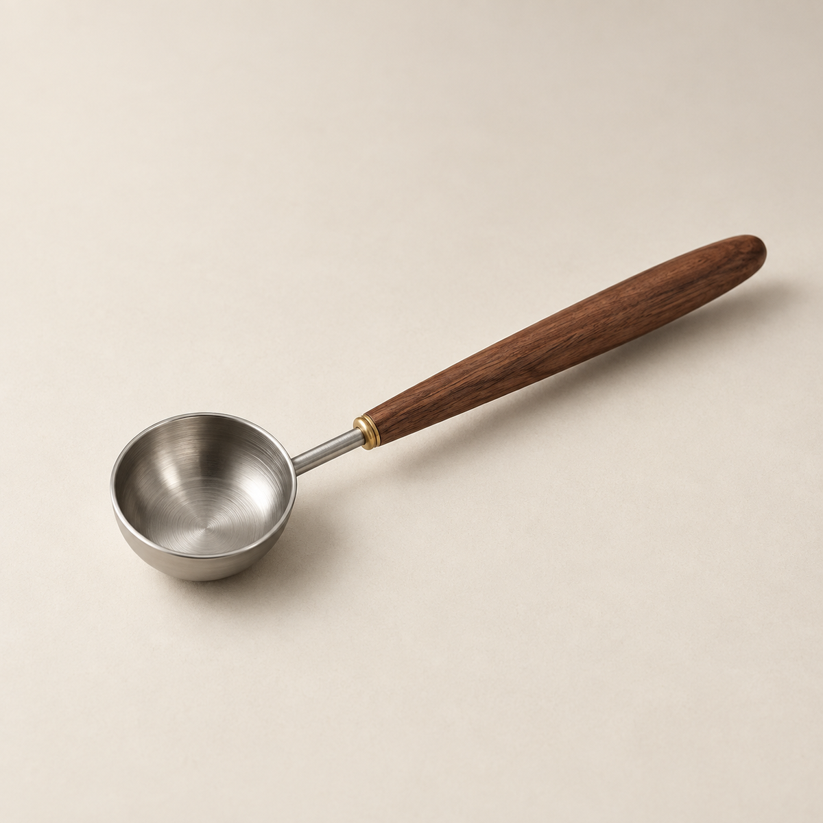 Daily Measure Stainless Coffee Scoop: on a cream background