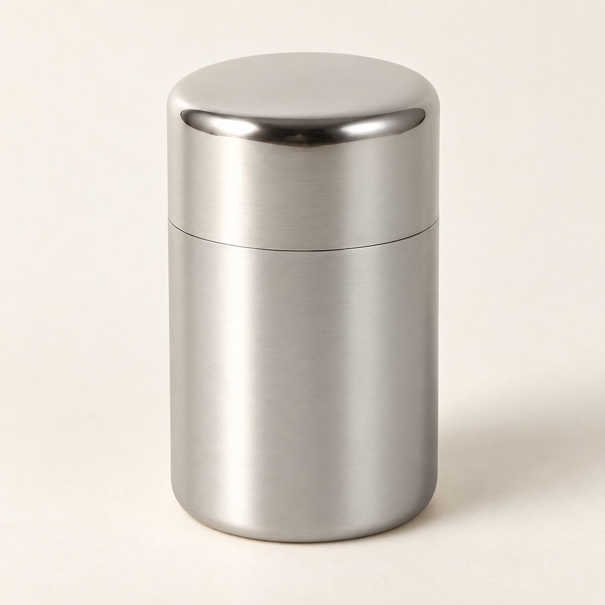Stainless steel tea caddy in the cream studio