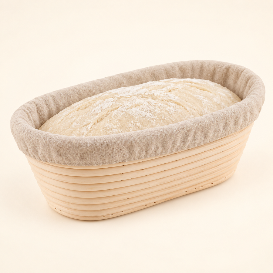 Oval proving basket with liner in the cream studio