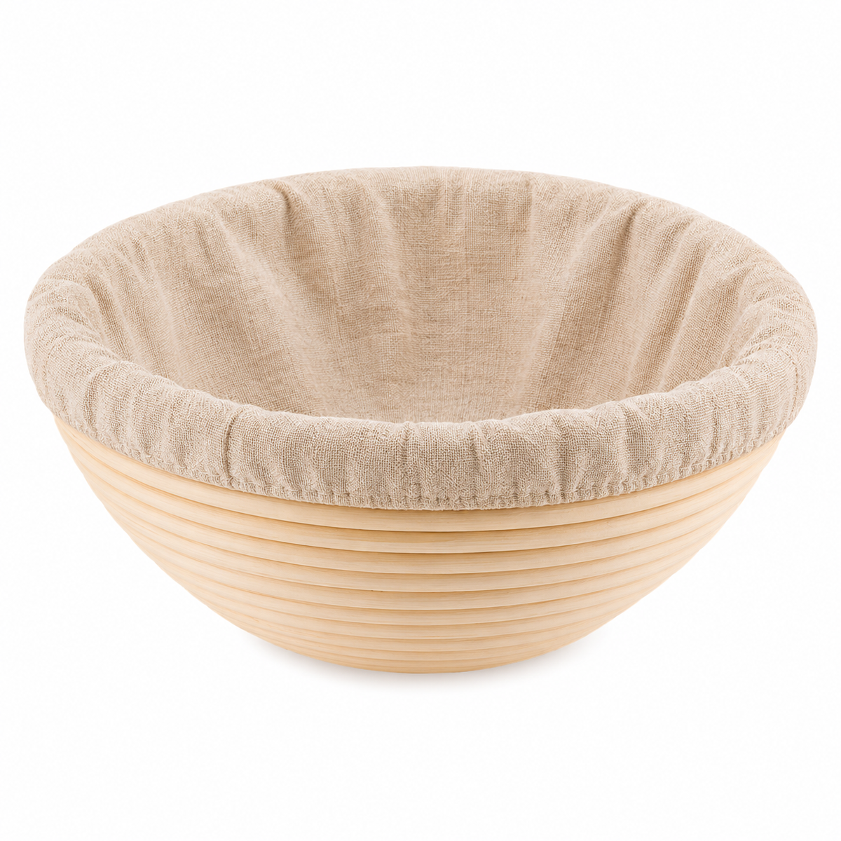 Round proving basket with liner on a white background