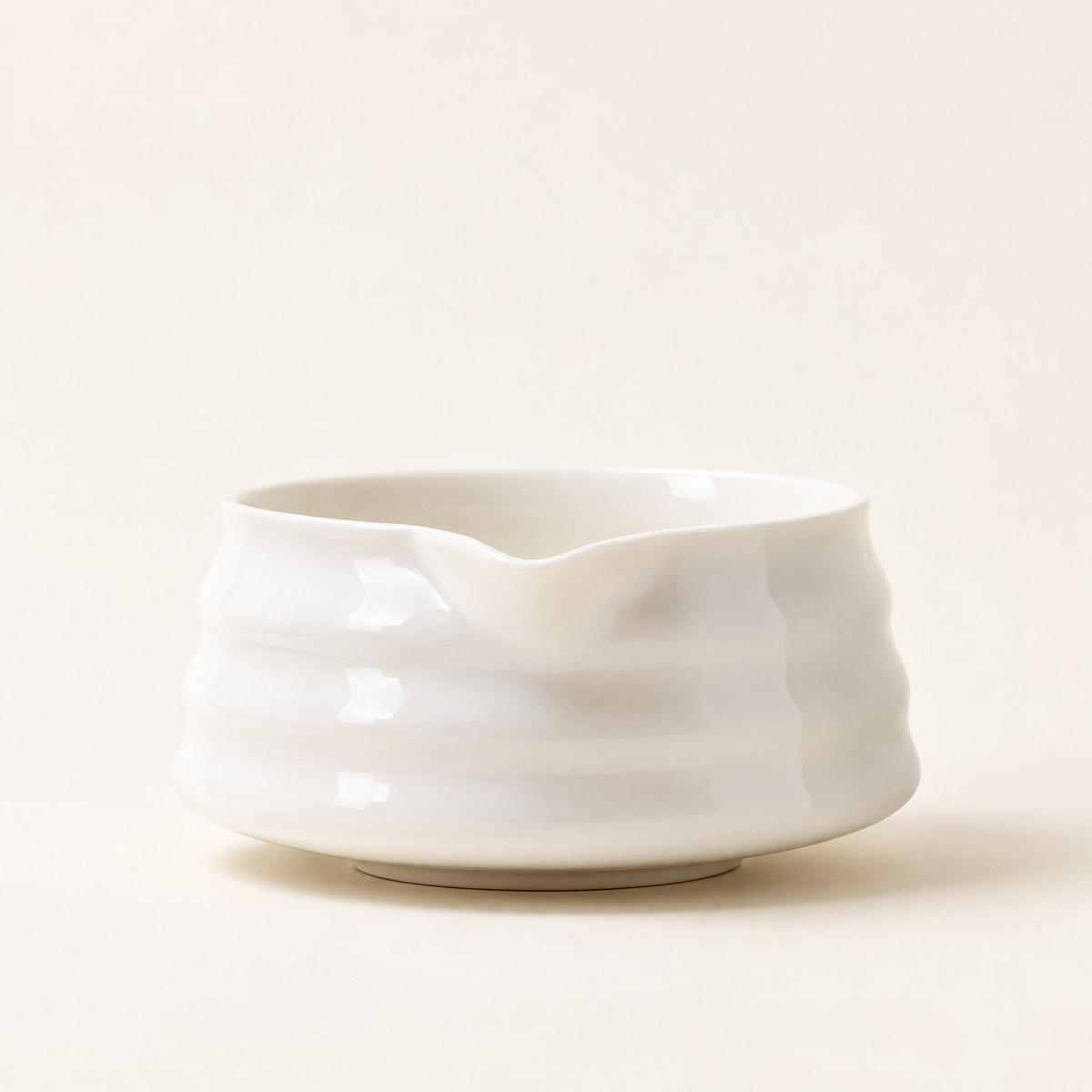 White spouted matcha bowl in the cream studio